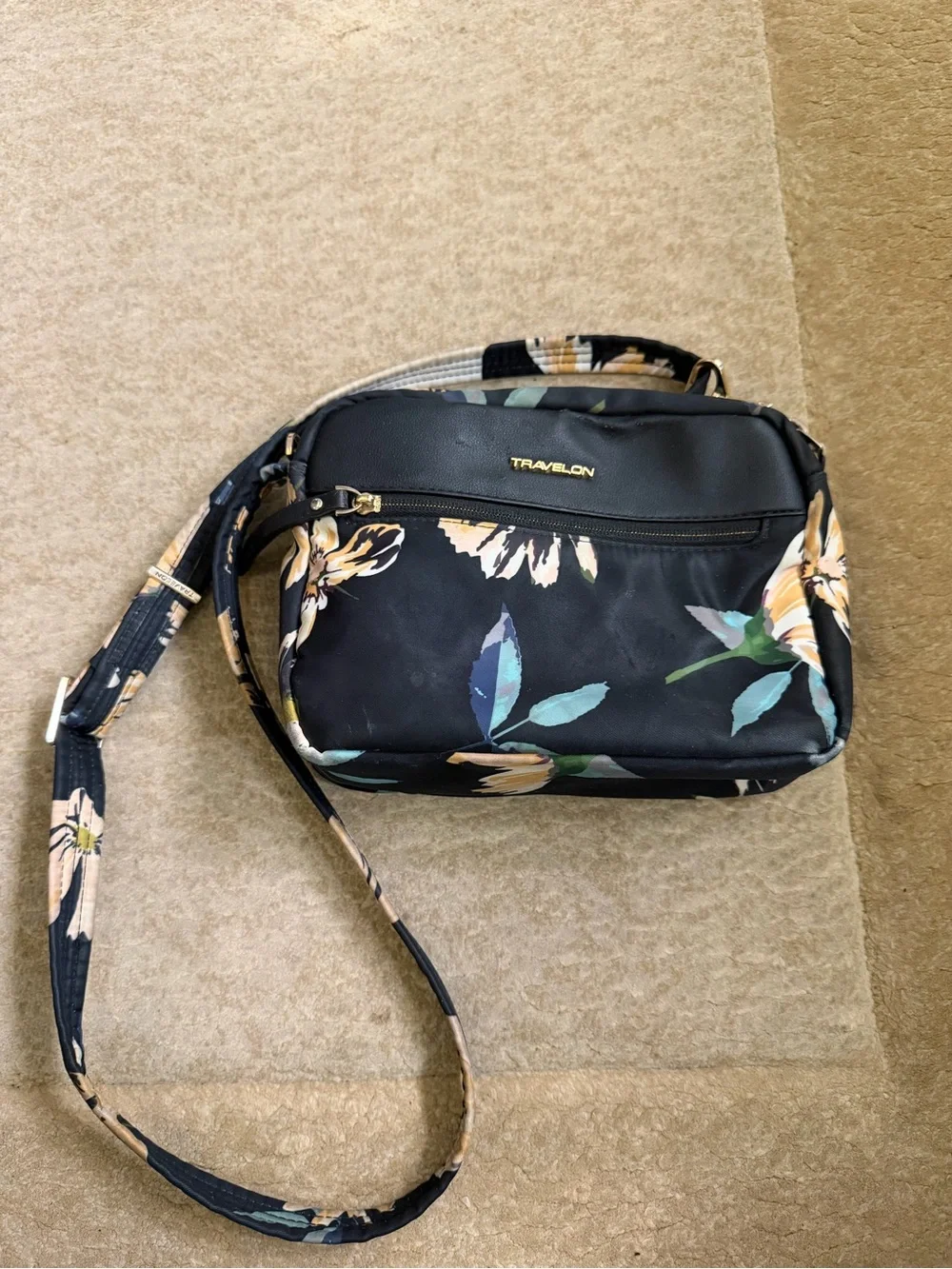 Travelon Black Floral Crossbody with Teal and Yellow Accents - Picture 1 of 8